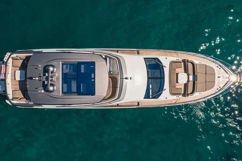 Transcendence Yacht Photos Pics Overhead view of 2020 Azimut 78 Flybridge yacht on clear blue water.