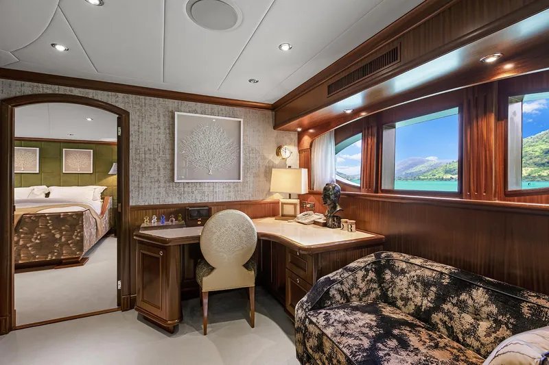  Yacht Photos Pics Luxurious Sovereign Tri-Deck yacht interior, featuring elegant wood finishes and scenic ocean views.