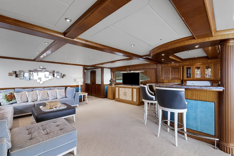  Yacht Photos Pics Luxurious 2003 Sovereign Tri-Deck yacht interior with elegant seating, bar, and modern decor.