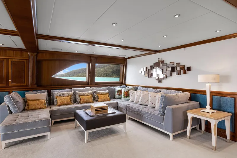  Yacht Photos Pics Luxurious Sovereign Tri-Deck 2003 yacht interior with plush seating and elegant decor.