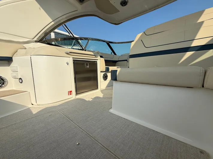  Yacht Photos Pics 2024 Formula 350 Crossover Bowrider interior with seating and storage, showcasing luxury design.
