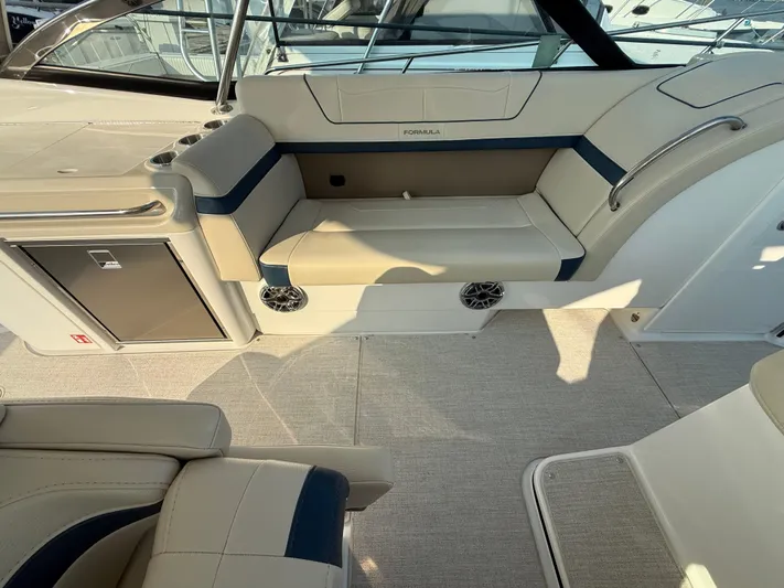  Yacht Photos Pics 2024 Formula 350 Crossover Bowrider interior with beige seating and modern design.