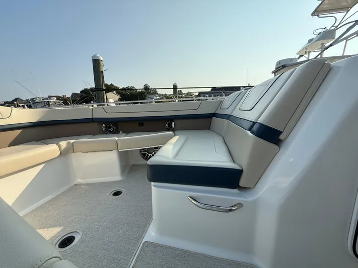  Yacht Photos Pics 2024 Formula 350 Crossover Bowrider interior seating with luxurious upholstery and sleek design.