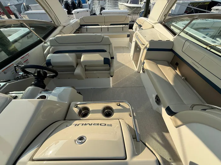  Yacht Photos Pics 2024 Formula 350 Crossover Bowrider interior with luxurious seating and modern design.