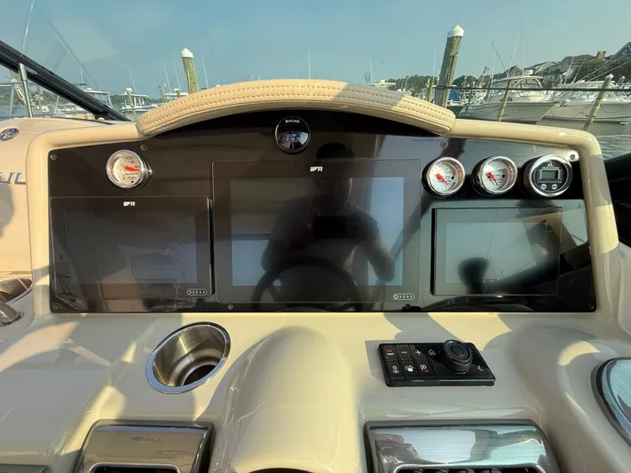  Yacht Photos Pics 2024 Formula 350 Crossover Bowrider dashboard with modern controls and navigation displays.