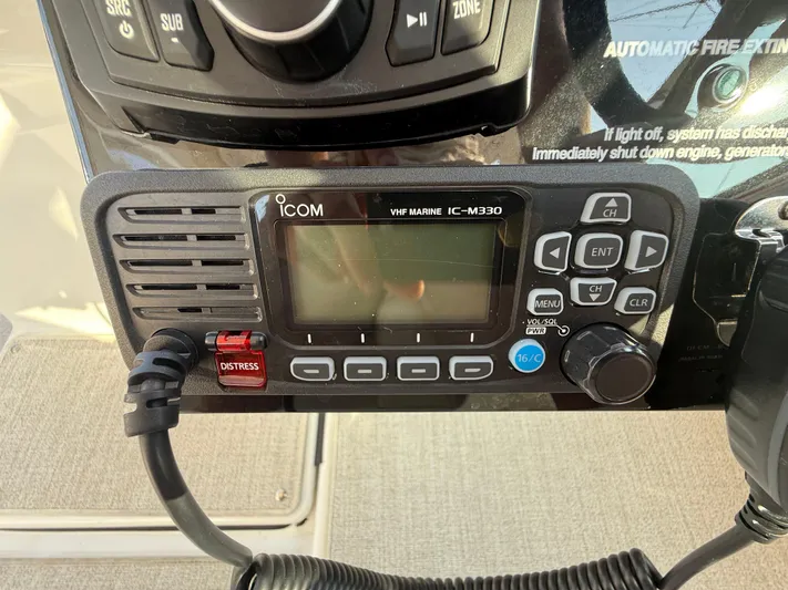  Yacht Photos Pics VHF marine radio on 2024 Formula 350 Crossover Bowrider dashboard.