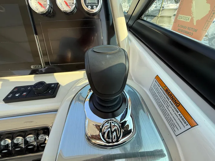  Yacht Photos Pics 2024 Formula 350 Crossover Bowrider dashboard with controls and warning label.