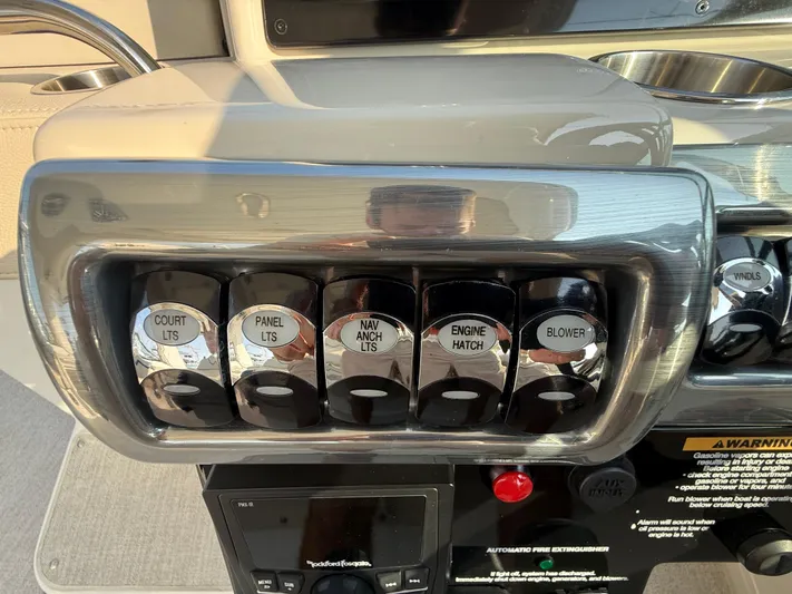  Yacht Photos Pics Control panel of 2024 Formula 350 Crossover Bowrider with labeled switches and buttons.