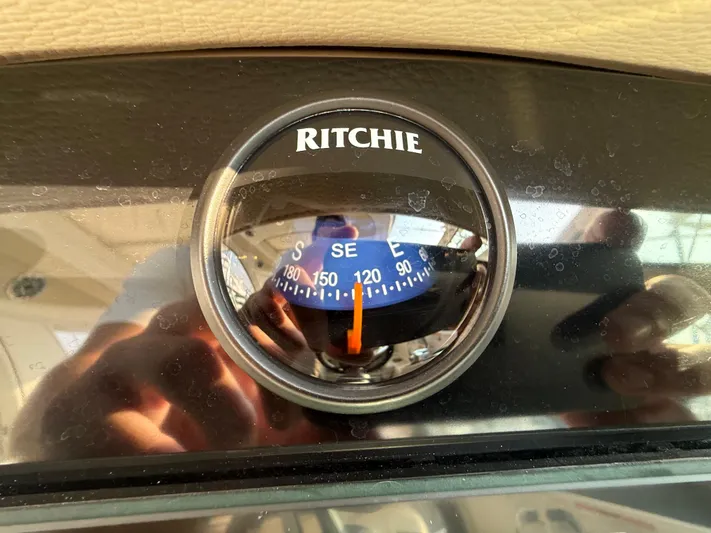  Yacht Photos Pics Compass on 2024 Formula 350 Crossover Bowrider dashboard, showing southeast direction.