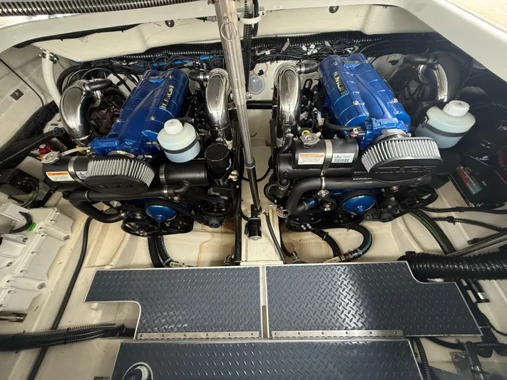  Yacht Photos Pics 2024 Formula 350 Crossover Bowrider engine compartment with dual blue engines.