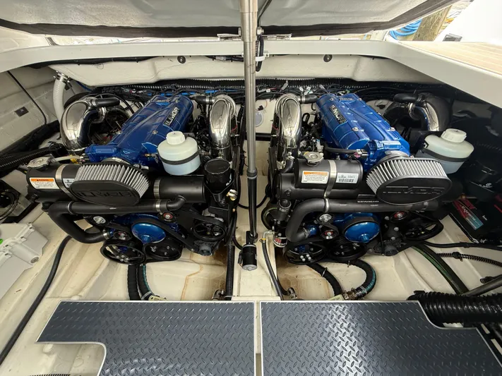  Yacht Photos Pics 2024 Formula 350 Crossover Bowrider engine compartment with dual blue engines.