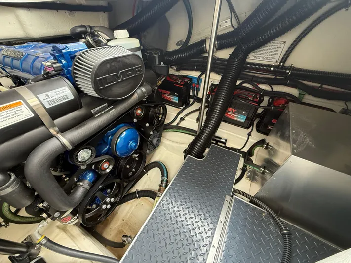  Yacht Photos Pics Engine compartment of 2024 Formula 350 Crossover Bowrider, featuring Ilmor engine and battery setup.