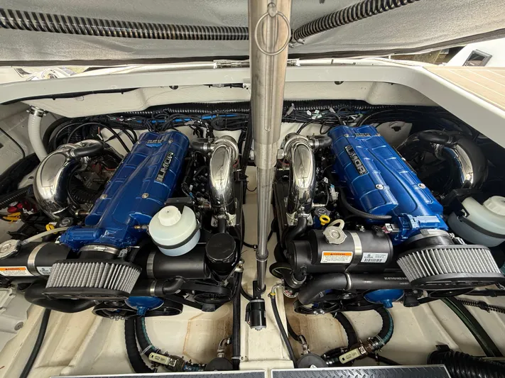  Yacht Photos Pics 2024 Formula 350 Crossover Bowrider engine compartment with dual blue engines.