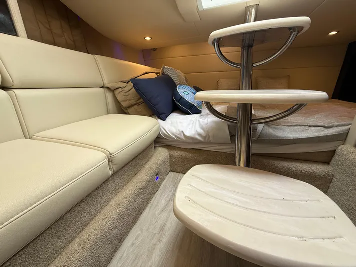  Yacht Photos Pics 2024 Formula 350 Crossover Bowrider interior with beige seating and modern design.