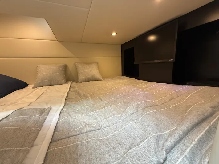  Yacht Photos Pics 2024 Formula 350 Crossover Bowrider cabin with cozy bed and TV.