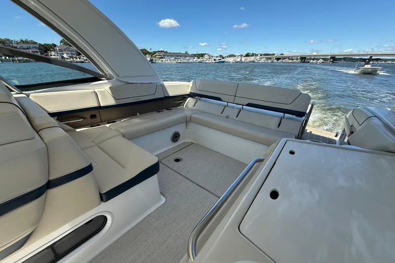  Yacht Photos Pics 2024 Formula 350 Crossover Bowrider interior with luxurious seating on open water.