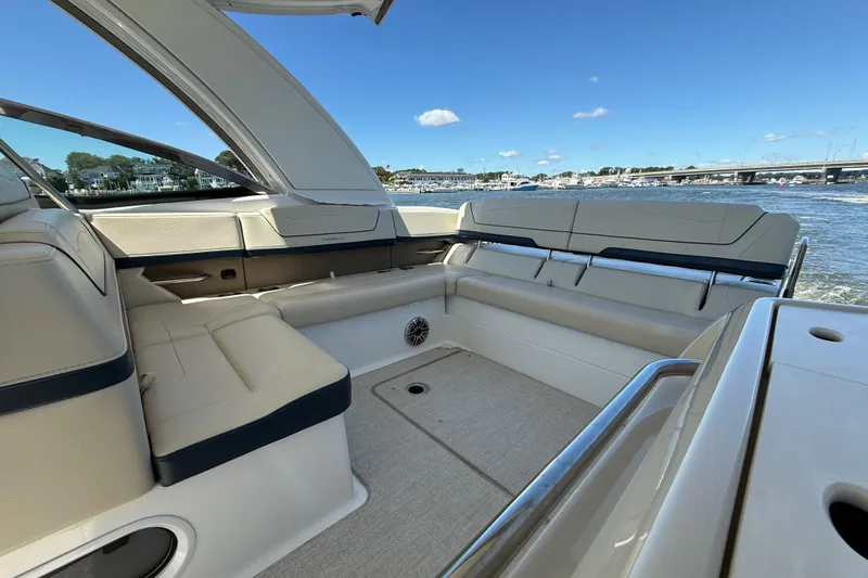  Yacht Photos Pics 2024 Formula 350 Crossover Bowrider interior with luxurious seating and scenic water view.