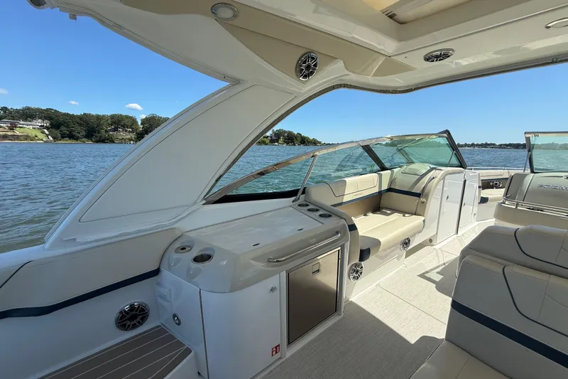  Yacht Photos Pics 2024 Formula 350 Crossover Bowrider interior with luxurious seating and scenic water view.