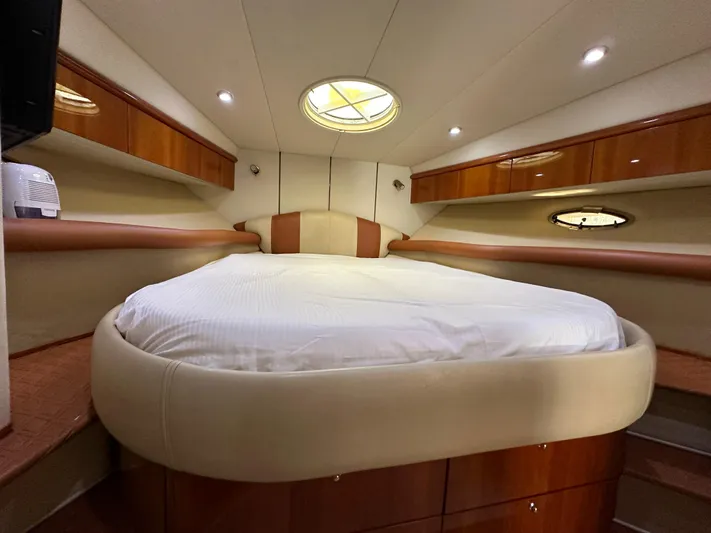  Yacht Photos Pics Luxurious cabin interior of 2001 Sunseeker 44 Camargue yacht with cozy bed.