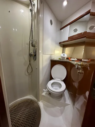  Yacht Photos Pics Luxurious bathroom in 2001 Sunseeker 44 Camargue yacht with shower and toilet.