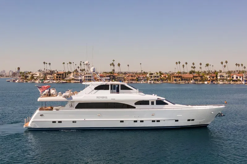 Reverie Yacht Photos Pics Luxury yacht "Reverie" cruising near coastal homes, 2005 C Custom model.