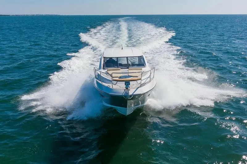  Yacht Photos Pics 2025 Hanover 375 yacht cruising swiftly on open sea.