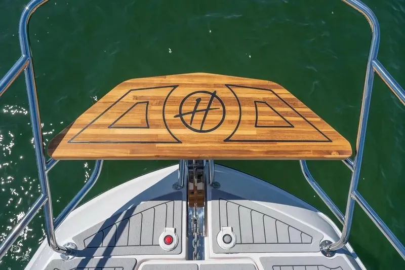 Yacht Photos Pics Bow of Hanover 375 boat, featuring a stylish wooden deck, 2025 model.
