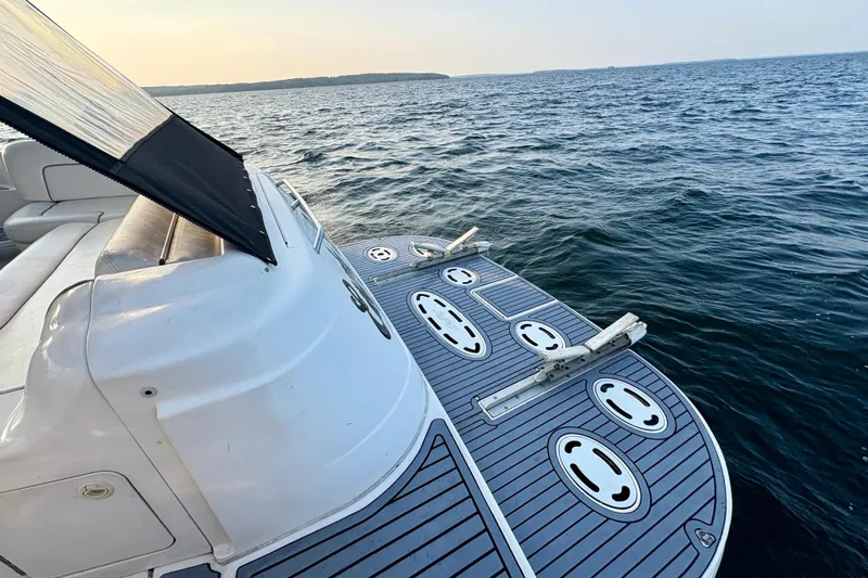 Empty Pockets Yacht Photos Pics 1999 Sea Ray 460 Sundancer yacht on open water, featuring a spacious deck.