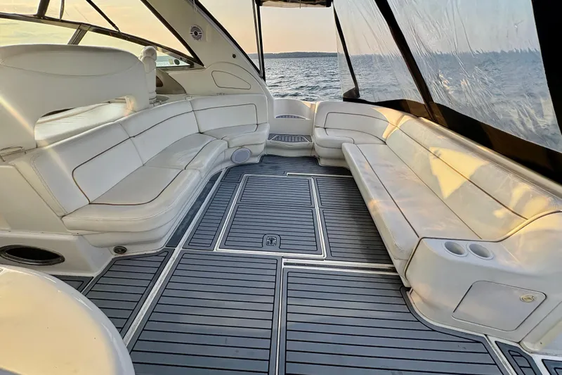 Empty Pockets Yacht Photos Pics Luxurious interior of 1999 Sea Ray 460 Sundancer yacht with spacious seating and ocean view.