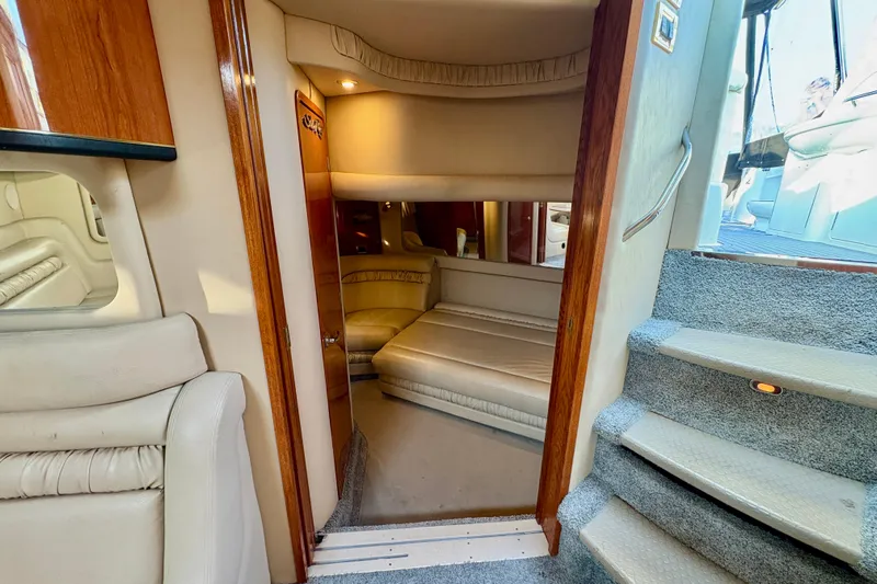 Empty Pockets Yacht Photos Pics Interior of 1999 Sea Ray 460 Sundancer yacht, featuring cozy cabin and elegant design.