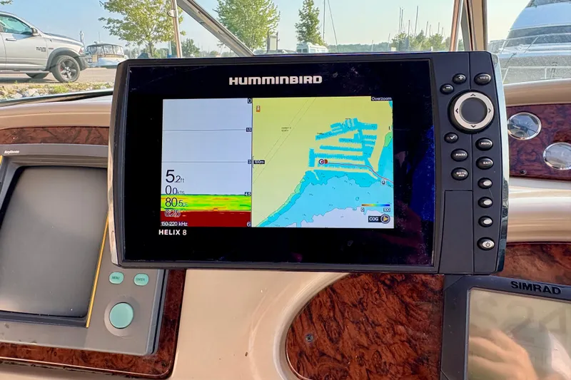 Empty Pockets Yacht Photos Pics Humminbird Helix 8 navigation system on 1999 Sea Ray 460 Sundancer yacht dashboard.