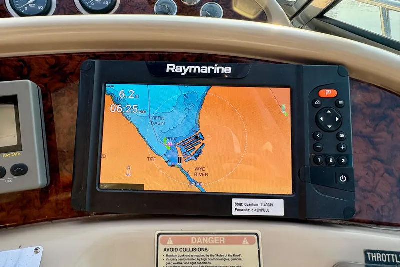 Empty Pockets Yacht Photos Pics Raymarine navigation system on 1999 Sea Ray 460 Sundancer boat dashboard.