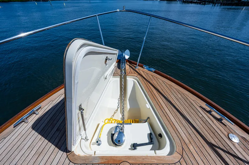 Lionheart Yacht Photos Pics Anchor compartment on 2008 Hinckley Talaria 44 FB yacht, open on teak deck.