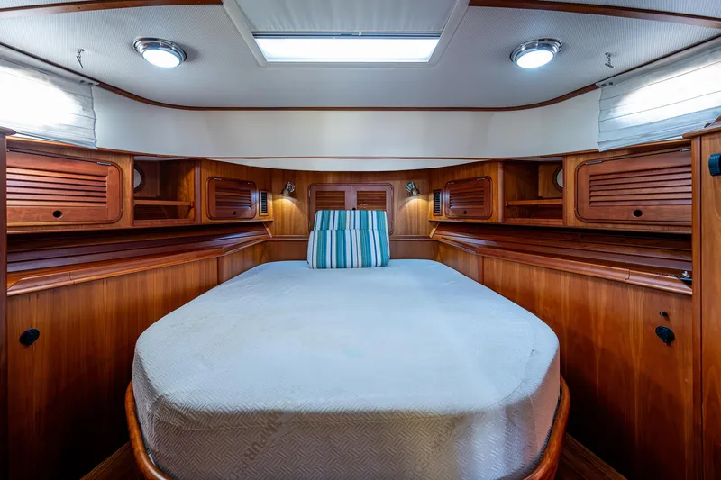 Lionheart Yacht Photos Pics Luxurious cabin interior of 2008 Hinckley Talaria 44 FB yacht with wood finish.