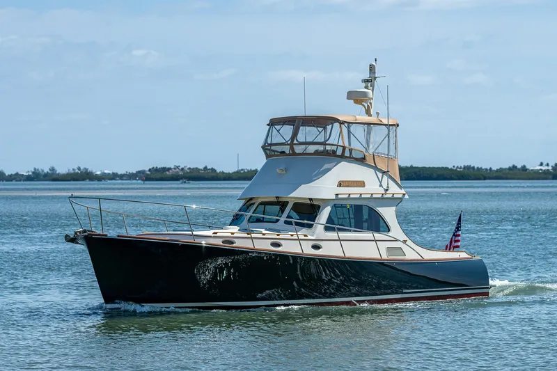 Lionheart Yacht Photos Pics 2008 Hinckley Talaria 44 FB yacht cruising on calm waters.