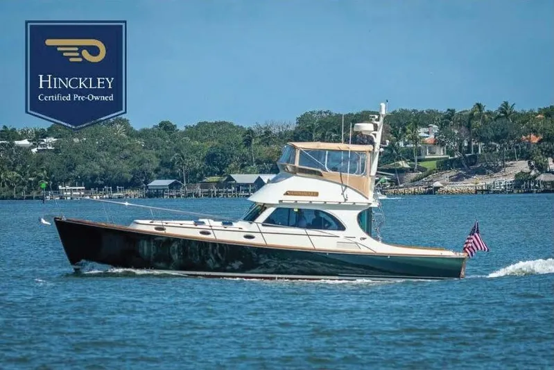 Lionheart Yacht Photos Pics 2008 Hinckley Talaria 44 FB yacht cruising on a sunny day, certified pre-owned.