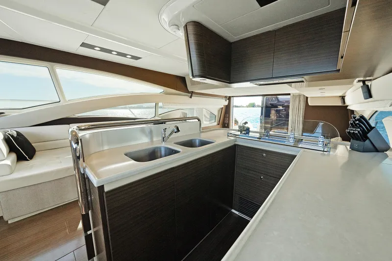 Acciaio Blu Yacht Photos Pics Luxurious interior of 2017 Azimut 60 Flybridge yacht with modern kitchen design.