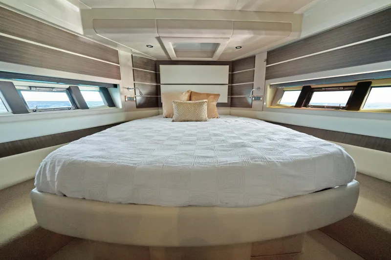 Acciaio Blu Yacht Photos Pics Luxurious bedroom interior of 2017 Azimut 60 Flybridge yacht with elegant bedding.