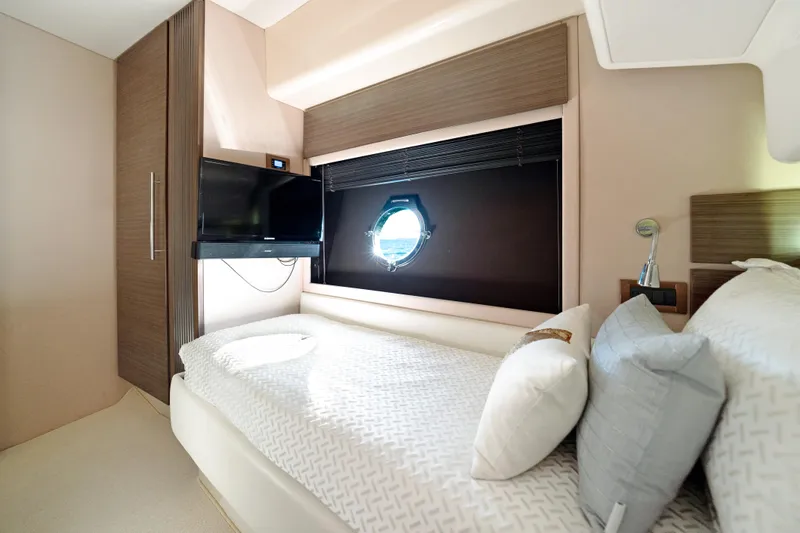 Acciaio Blu Yacht Photos Pics Luxurious bedroom interior of 2017 Azimut 60 Flybridge yacht with modern decor.