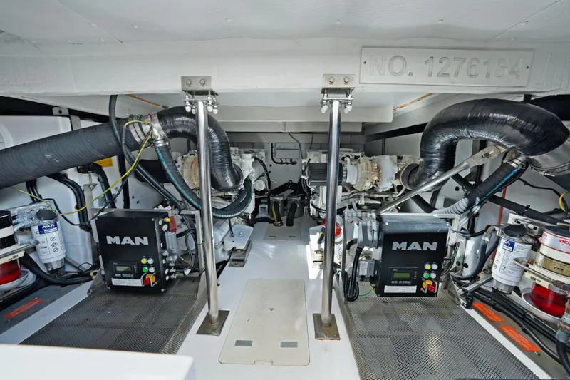 Acciaio Blu Yacht Photos Pics Engine room of 2017 Azimut 60 Flybridge yacht, featuring MAN engines and mechanical components.