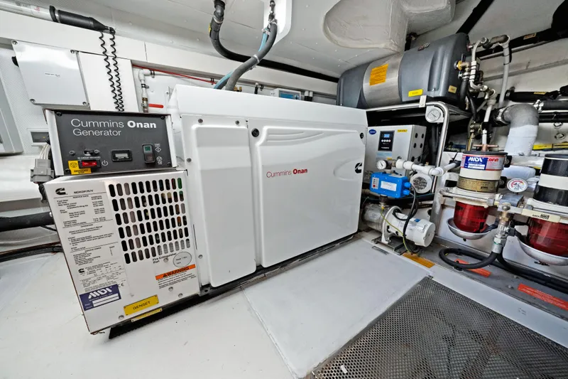 Acciaio Blu Yacht Photos Pics Engine room of 2017 Azimut 60 Flybridge with Cummins Onan generator.