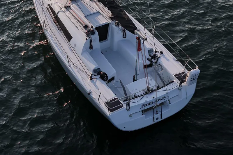 From Away Yacht Photos Pics 2017 Jeanneau SunFast 3200 sailboat on water, aerial view of deck and cockpit.