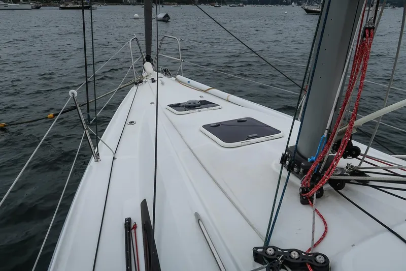From Away Yacht Photos Pics 2017 Jeanneau SunFast 3200 sailboat deck with rigging and hatches on water.