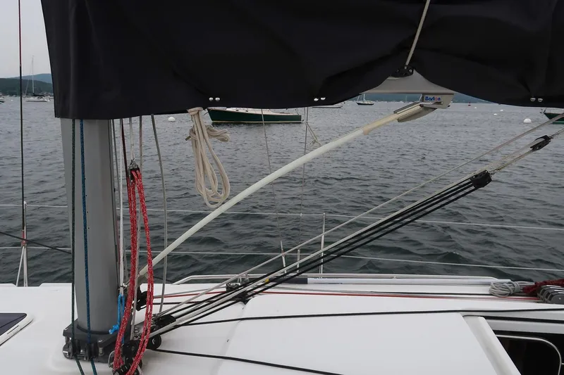 From Away Yacht Photos Pics 2017 Jeanneau SunFast 3200 sailboat deck with rigging and ropes on a calm sea.