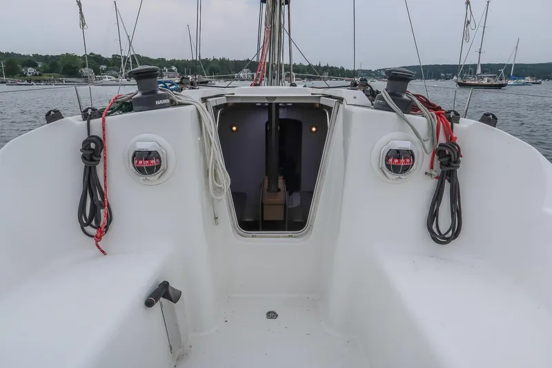 From Away Yacht Photos Pics Cockpit view of 2017 Jeanneau SunFast 3200 sailboat with ropes and winches.