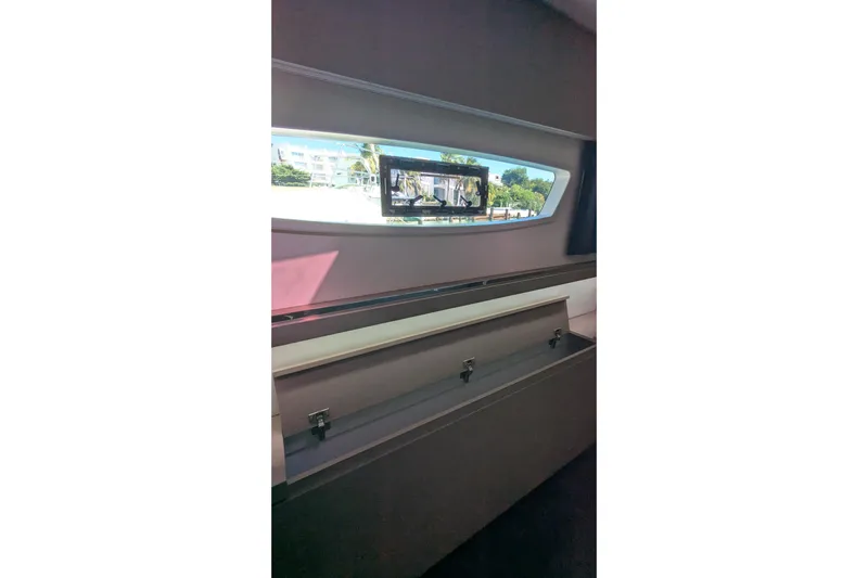 Wanderlust Yacht Photos Pics Interior view of 2020 Fountaine Pajot Saona 47 yacht with window and storage.
