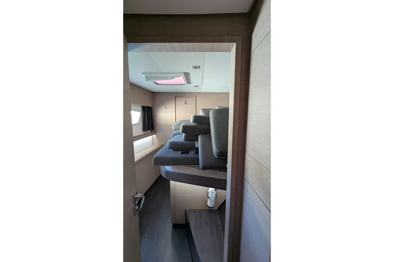 Wanderlust Yacht Photos Pics Interior of 2020 Fountaine Pajot Saona 47 yacht cabin with stacked cushions.