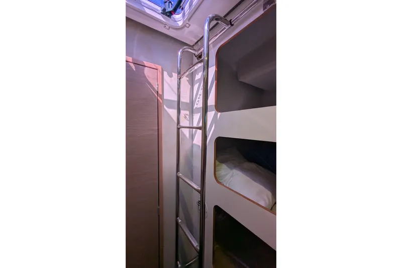 Wanderlust Yacht Photos Pics Interior of 2020 Fountaine Pajot Saona 47 yacht with bunk beds and ladder.