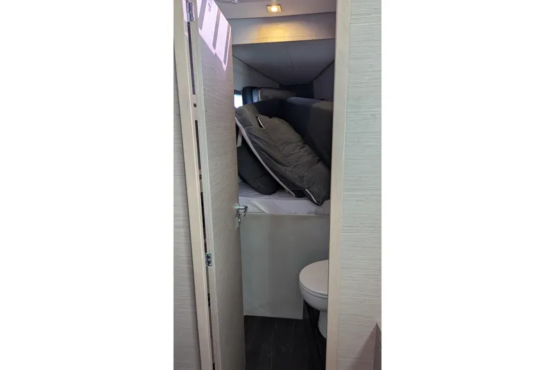 Wanderlust Yacht Photos Pics Interior of 2020 Fountaine Pajot Saona 47 yacht, featuring compact bathroom and storage area.
