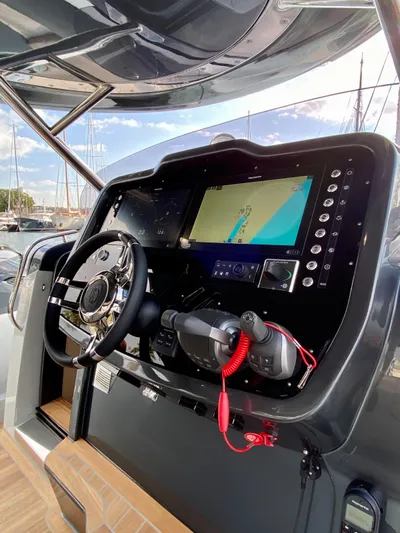 Seayou Yacht Photos Pics 2022 SACS Strider 15 yacht dashboard with navigation controls and display.